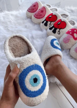 MAKE YOU SNUGGLE EVIL EYE SLIPPERS